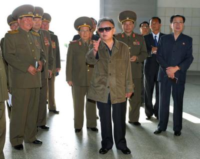 North Korean leader Kim Jong Il inspects a fruit farm in Pyongyang.