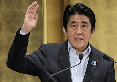 Japanese Prime Minister Shinzo Abe delivers a speech during a seminar in Tokyo Wednesday, June 5, 2013. (Photo: AAP)