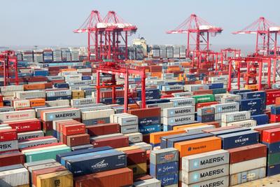 Piles of containers are pictured at a terminal of Yangshan Deep-water Port in Shanghai, China, 10 September 2013. (Photo: AAP)