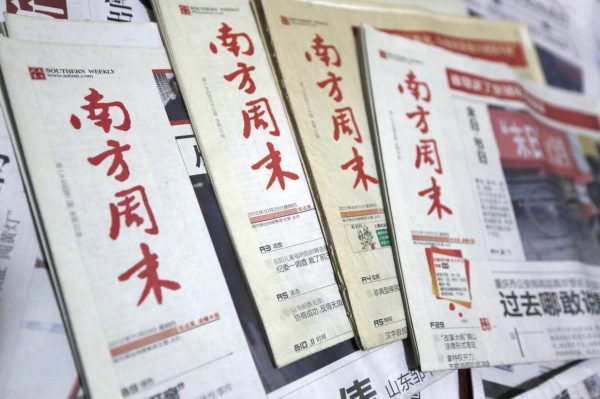 Past issues of Southern Weekly newspapers are pictured in Beijing, China, 08 January 2013. (Photo: AAP)