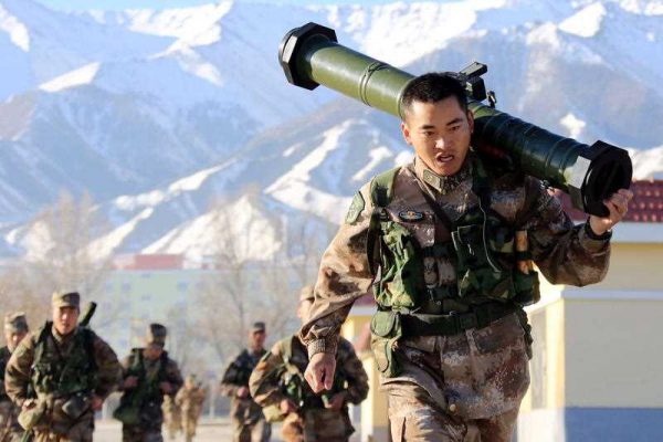 Armed Chinese People's Liberation Army take part in a training session at the foot of Tianshan Mountains in northwest China's Xinjiang Uygur Autonomous Region. (Photo: AAP)