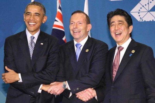 US President Barack Obama, Australian Prime Minister Tony Abbot and Japanese Prime Minister Shinzo Abe shake hands prior to the G-20 summit in Brisbane, Australia on Nov. 16, 2014. The three leaders agreed to deepen their security cooperation. (Photo: AAP)