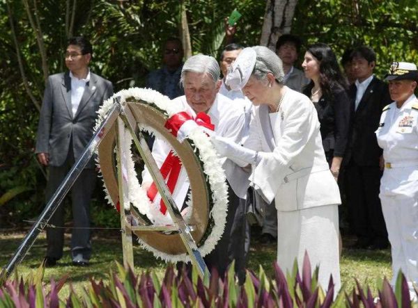 Japanese Emperor Akihito and Empress Michiko offer a flower wreath at a memorial for the US military as they offer prayers for war victims at Peleliu island in Palau on 9 April 2015. 15 August 2015 marks the 70th anniversary of the end of the Pacific War. (Photo: AAP).