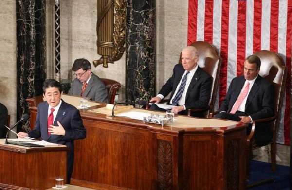 Japanese Prime Minister Shinzo Abe delivers his speech at the podium during a joint session of the US Congress in Washington, DC, USA on 29 April 2015. (Photo: AAP)