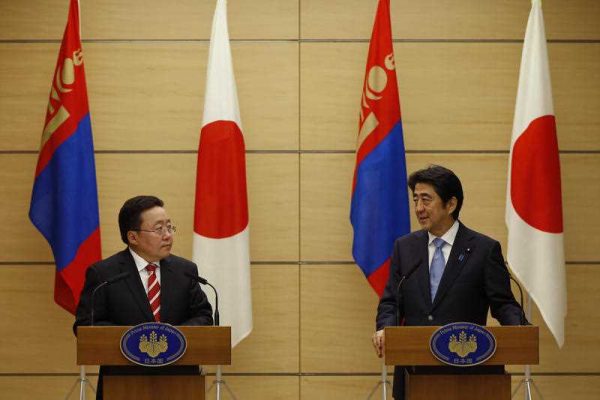 Mongolian President Tsakhia Elbegdorj and Japan's Prime Minister Shinzo Abe attend a joint press conference. Japan and Mongolia are the two countries that remain the key promoters of the human security concept in the Asia Pacific. (Photo: AAP)