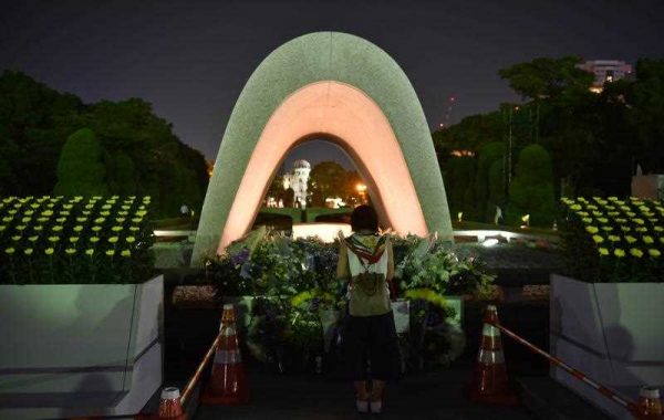 A woman visits the Peace Memorial Park to pray for victims of the atomic bombing in Hiroshima on 5 August 2015. (Photo: AAP)