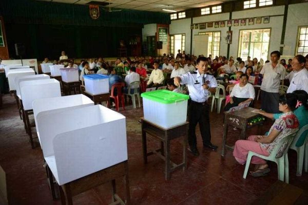 Local election officials conduct a voting simulation at a school compound in Yangon on November 1, 2015, during training of volunteers for election duties supervised by Union Election Commission (UEC) officials ahead of the November 8 polls. (Photo: AAP)
