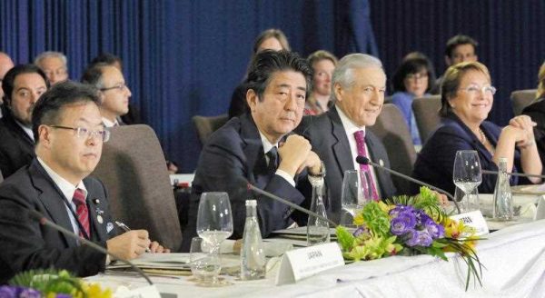 Japanese Prime Minister Shinzo Abe attends a meeting in Manila on 18 November, 2015, with his counterparts from 11 other countries involved in the Trans-Pacific Partnership trade bloc. (Photo: AAP)