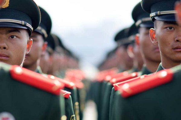 Chinese soldiers line up during a ceremony in Kunming city, southwest China's Yunnan province, 25 November 2015. (Photo: AAP)