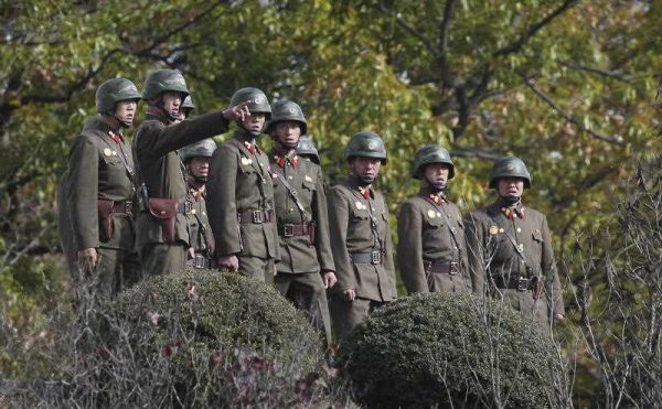 North Korean army solider look southern side as U.S. Defense Secretary Ash Carter visits at the border village of Panmunjom, which has separated the two Koreas since the Korean War, in Paju, South Korea, Sunday, Nov. 1, 2015. (Photo: AAP)
