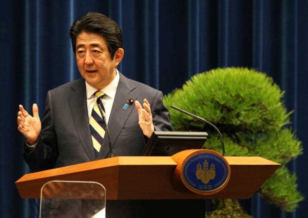 Japanese Prime Minister Shinzo Abe speaks at his first press conference of the year at the Prime Minister’s Office in Chiyoda Ward, Tokyo on January 4 2016. (Photo: AAP).