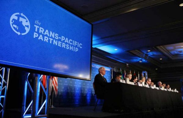 Delegates from the 12 countries attend a joint press conference in Atlanta, USA on 5 October 2015 after reaching an agreement on the Trans-Pacific Partnership. (Photo: AAP).