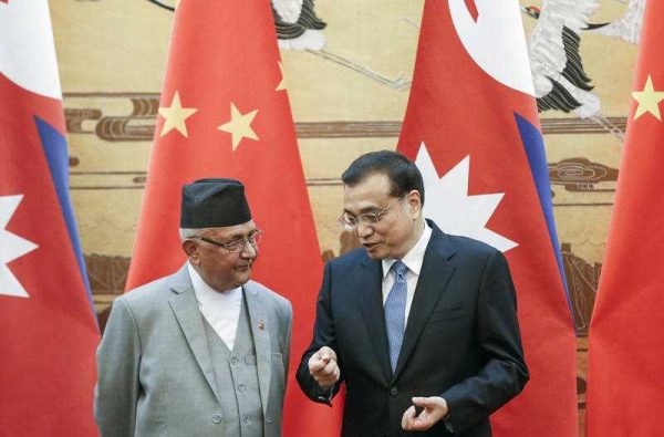 Nepalese Prime Minister K. P. Sharma Oli and his Chinese counterpart Li Keqiang speaking at Beijing's Great Hall of the People on 21 March 2016. (Photo: AAP)