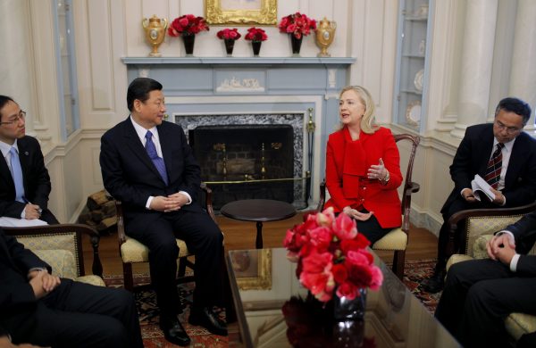 Then-secretary of state Hillary Clinton meets with then-Chinese vice president Xi Jinping at the State Department in Washington, 14 February 2014. (Photo: AAP).