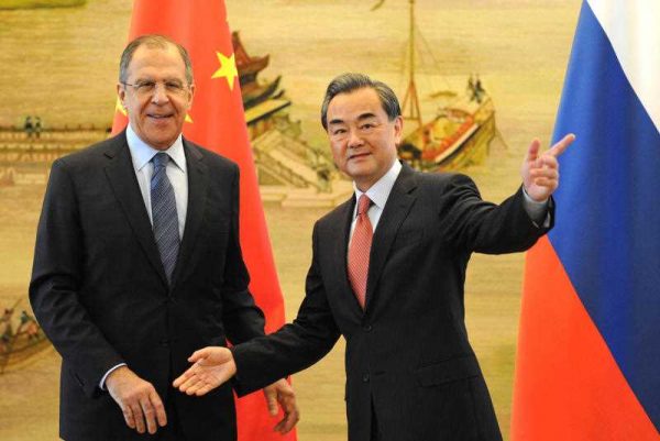 Russian Foreign Minister Sergey Lavrov (L) and his Chinese counterpart Wang Yi attend a joint press conference at the Chinese Foreign Ministry in Beijing, China on 29 April 2016.