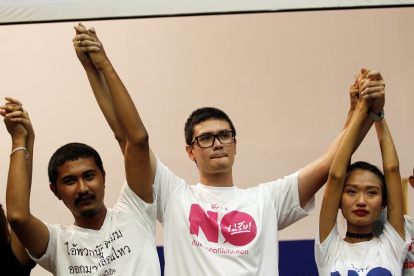 Student activist supporters who oppose a junta-backed constitution react after losing the constitutional referendum vote in Thailand. (Photo: Reuters)