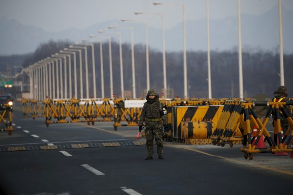 A South Korean soldier stands guard at a checkpoint on the Grand Unification Bridge, South Korea, February 11, 2016. (Photo: Reuters).