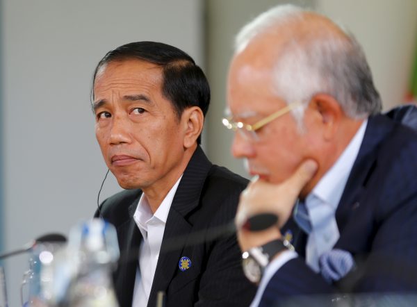 Joko Widodo, President of Indonesia listens to US President Barack Obama speak during a 10-nation Association of Southeast Asian Nations (ASEAN) summit in Rancho Mirage, California 15 February 2016. (Photograph: Reuters/Mike Blake).