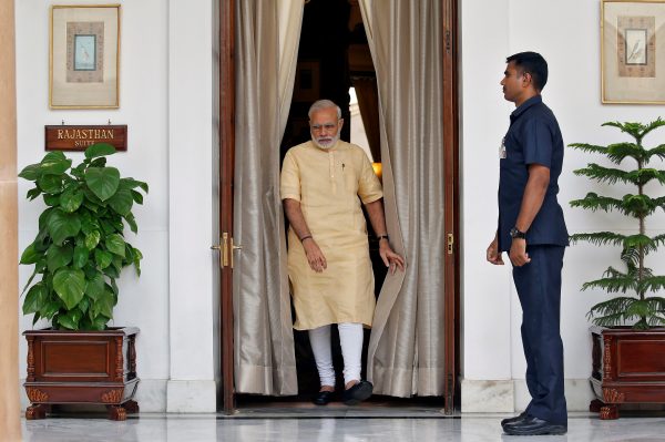 India's Prime Minister Narendra Modi inside Hyderabad House in Delhi, India. (Photo: Reuters/Cathal McNaughton).