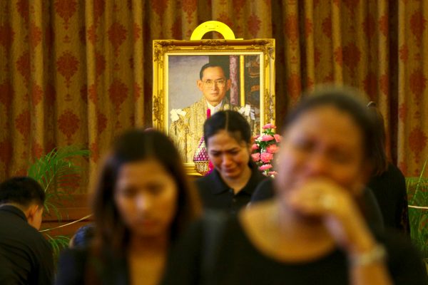 People mourn after offer condolences for Thailand's late King Bhumibol Adulyadej at the Grand Palace in Bangkok, Thailand. 14 October 2016. (Photo: Reuters/Athit Perawongmetha)The 70-year reign of Thailand’s King Bhumibol Adulyadej started and ended inauspiciously. It was a family tragedy that unexpectedly brought Bhumibol to the throne. While he went on to become the world’s longest serving monarch, Bhumibol’s formidable legacy is deeply tarnished by the ambitions of those who fought hardest to defend him.
