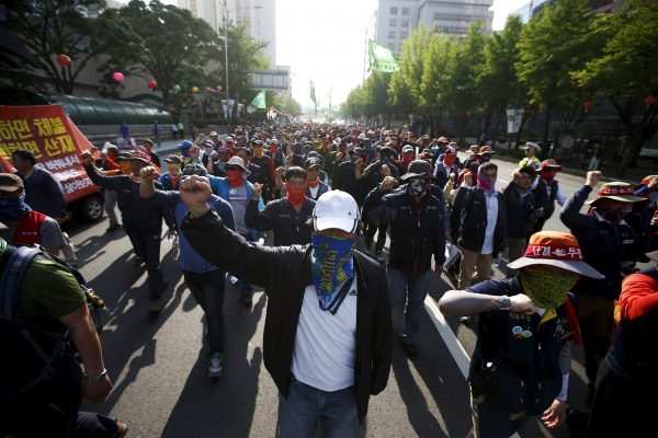 Workers from the Korean Confederation of Trade Unions (KCTU) protest in Seoul, South Korea, 1 May, 2015 (Photo: Reuters/Kim Hong-Ji).