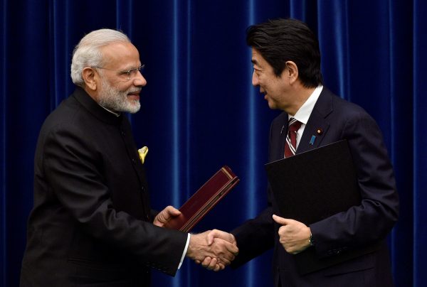Indian Prime Minister Narendra Modi and his Japanese counterpart Shinzo Abe shake hands during a joint press conference at Abe's official residence in Tokyo, Japan 11 November 2016 (Photo: Reuters/Franck Robichon)