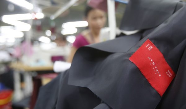 Labourers work to make Zara jackets at a garment factory in Bac Giang province, near Hanoi 21 October 2015. Vietnam's textiles and footwear would have gained strongly from the TPP, after exports of US$31 billion in 2014 for brands such as Nike, Adidas, H&M, Gap, Zara, Armani and Lacoste. (Photo: Reuters/Kham)