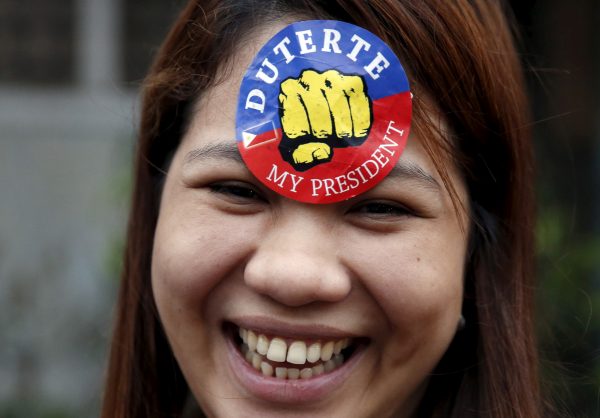 A supporter of President Rodrigo Duterte is pictured during presidential election campaigning in Malabon, Metro Manila in the Philippines 27 April 2016. (Photo: Reuters/Erik De Castro).