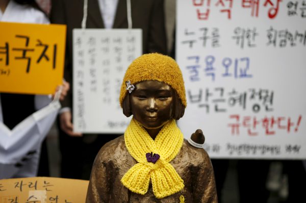 A statue symbolising comfort women is seen during a weekly anti-Japan rally in front of the Japanese embassy in Seoul, South Korea, 30 December, 2015. (Photo: Reuters/Kim Hong-Ji).
