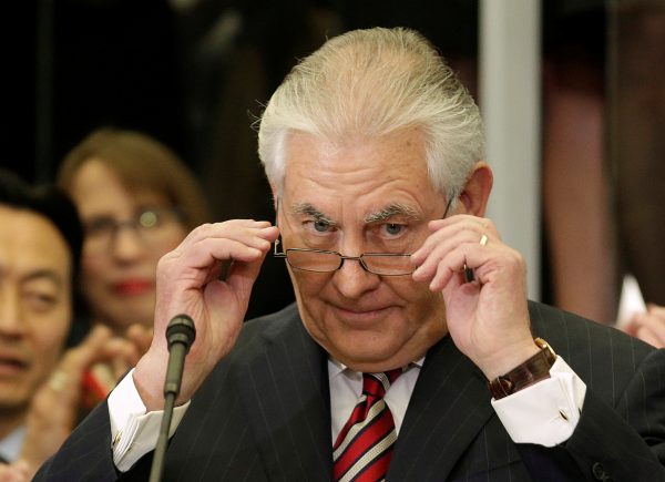 US Secretary of State Rex Tillerson removes his glasses after delivering remarks to Department of State employees in Washington DC, 2 February 2017. (Photo: Reuters/Joshua Roberts).
