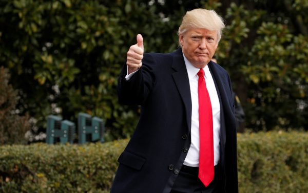 US President Donald Trump gives a thumbs up as he departs the White House in Washington to spend the weekend in Florida 3 February 2017. (Photo: Reuters/Kevin Lamarque).