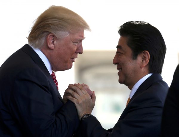 Japanese Prime Minister Shinzo Abe is greeted by US President Donald Trump in Washington, US. (Photo: Reuters/Joshua Roberts)
