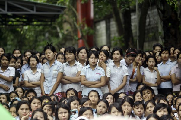 Workers from the Myue & Soe garment factory during a protest for a salary increase in front of the Mayangone township labour office in Yangon, 7 September, 2012 (Photo: Reuters/Soe Zeya Tun).
