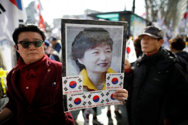 Supporters of Park Geun-hye attend a protest before the Constitutional Court ruling on Park's impeachment near the Constitutional Court in Seoul, South Korea, 10 March, 2017 (Photo: Reuters/Kim Hong-Ji).