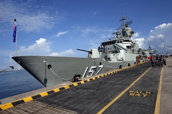 Australian navy personnel march past their HMAS Perth Anzac-class frigate on display ahead of the IMDEX Asia maritime defence exhibition at Changi Naval Base in Singapore 18 May 2015 (Photo: Reuters/Edgar Su).