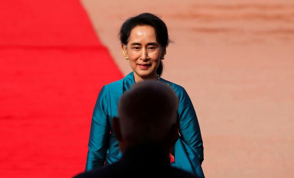 Myanmar's State Counsellor Aung San Suu Kyi walks after inspecting a guard of honour during her ceremonial reception at the forecourt of India's Rashtrapati Bhavan presidential palace in New Delhi, India, 18 October 2016. (Photo: Reuters/Adnan Abidi).