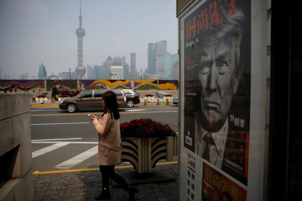 A Chinese magazine poster showing US President Donald Trump is displayed at a newsstand in Shanghai, China 21 March 2017. (Photo: Reuters/Aly Song).