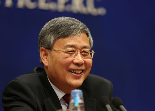 Guo Shuqing, China's newly appointed banking regulator, attends a news conference ahead of China's parliament in Beijing, 2 March 2017. (Photo: Reuters/Shu Zhang).
