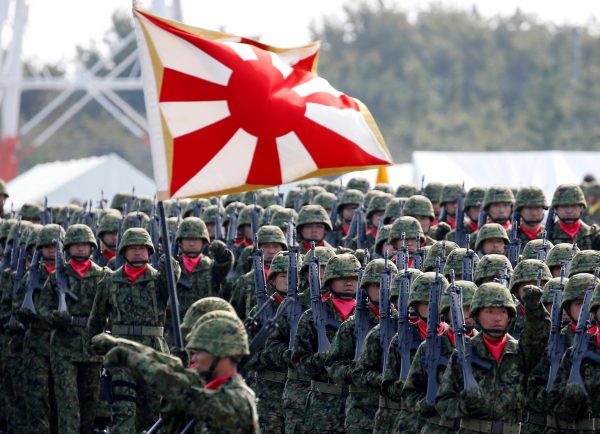 Members of Japan's Self-Defence Forces' infantry unit march during the annual SDF ceremony at Asaka Base, Japan, 23 October 2016 (Photo: Reuters/Kim Kyung-Hoon).