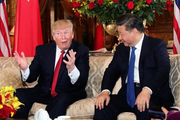 US President Donald Trump interacts with Chinese President Xi Jinping at Mar-a-Lago in Palm Beach, Florida, United States, 6 April 2017. (Photo: Reuters/Carlos Barria).