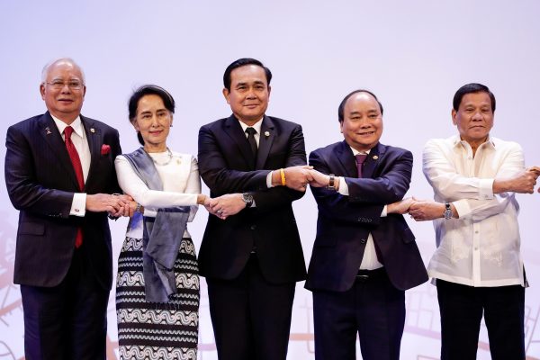 Association of Southeast Asian Nations (ASEAN) leaders link arms during the opening ceremony of the 30th ASEAN Summit in Manila, Philippines, 29 April 2017. (Photo: Reuters/Mark Crisanto).