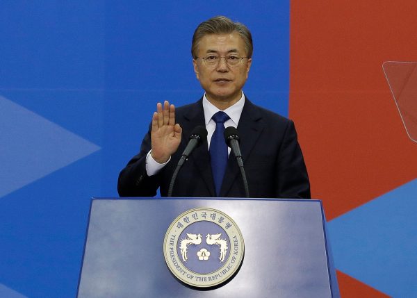 Newly elected South Korean President Moon Jae-in takes an oath during his inauguration ceremony at the National Assembly in Seoul, South Korea, 10 May 2017. (Photo: Reuters/Ahn Young-joon).
