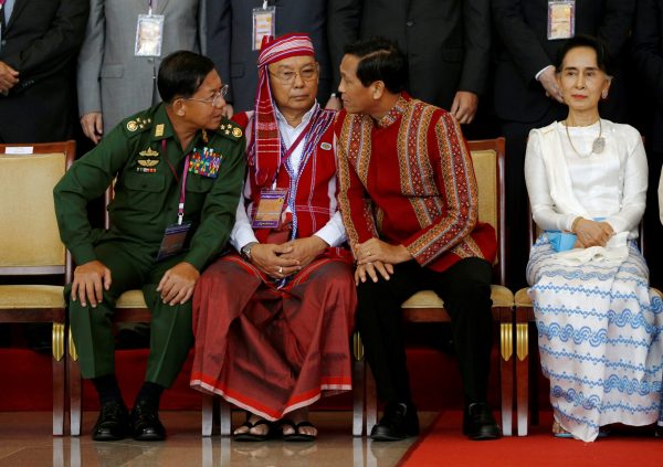 Myanmar military commander in chief Senior General Min Aung Hlaing, Speaker of upper house of parliament Mahn Win Khaing Than and Vice President Henry Van Thio chat next to State Counsellor Aung San Suu Kyi (Photo: Reuters/Soe Zeya Tun).
