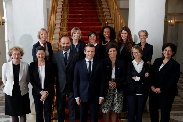 French President Emmanuel Macron and Prime Minister Edouard Philippe pose for a family photo with women of the government after the first cabinet meeting at the Elysee Palace in Paris, 18 May 2017 (Photo: REUTERS/Philippe Wojazer).