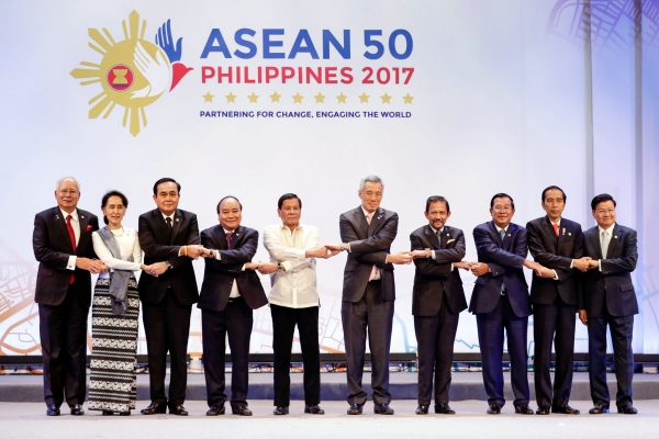 ASEAN leaders link hands at the opening of the 2017 summit in Manila. The grouping’s success in forging unity in diversity is ‘a beacon for our troubled world’. (Photo: Reuters/Mark Crisanto).