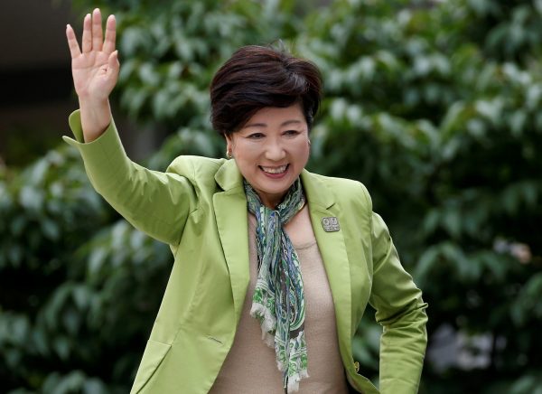 Tokyo Governor and head of Tokyo Citizens First party Yuriko Koike waves to voters atop of a campaign van as election campaign officially kicks off for Tokyo Metropolitan Assembly election, on the street in Tokyo 23 June 2017. (Photo: Reuters/Issei Kato).