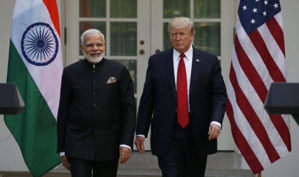 U.S. President Donald Trump (R) arrives for a joint news conference with Indian Prime Minister Narendra Modi in the Rose Garden of the White House in Washington, U.S., June 26, 2017. (Photo: Reuters/Kevin Lamarque).