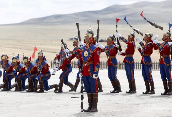 Mongolian guards of honour perform during the opening ceremony of Khaan Quest 2015, an annual multilateral military exercise, at a military training centre, near Ulaan Bator in Mongolia, 20 June 2015 (Photo: Reuters/B. Rentsendorj).