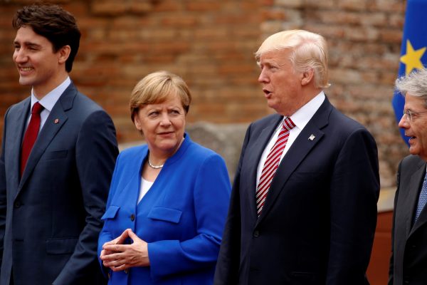 Canadian Prime Minister Justin Trudeau, German Chancellor Angela Merkel, US President Donald Trump and Italian Prime Minister Paolo Gentiloni pose for a family photo during the G7 Summit in Sicily, Italy, 26 May 2017. (Photo: Reuters/Jonathan Ernst).
