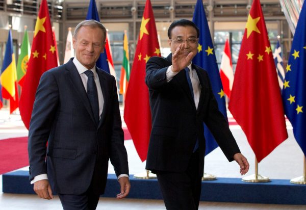 European Council President Donald Tusk and Chinese Premier Li Keqiang (R) arrive to attend a EU-China Summit in Brussels, Belgium June 2, 2017. (Photo: Reuters/Virginia Mayo).